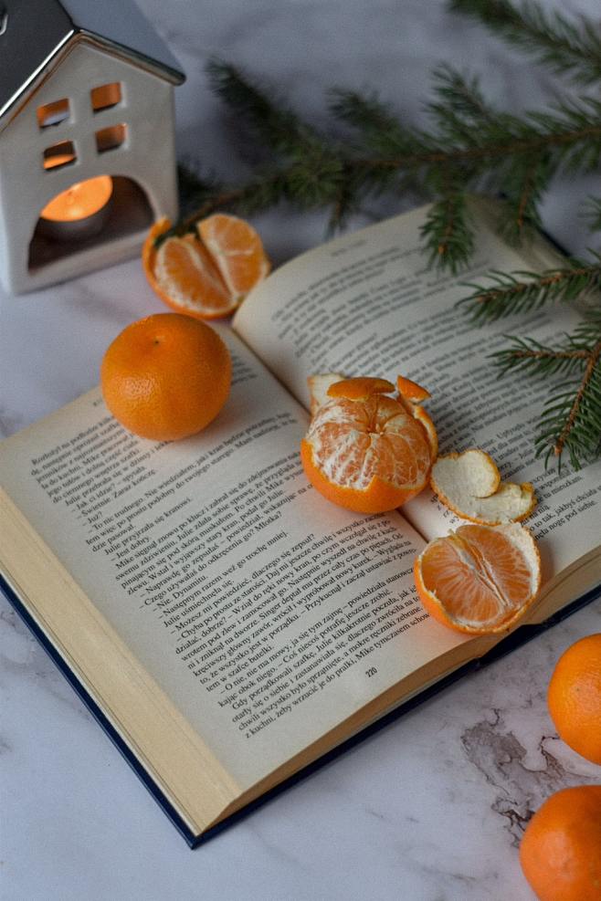 orange fruit on book...