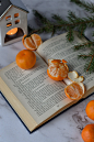 orange fruit on book page