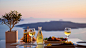 General 1366x768 bottles table blurred sea food glasses paprika (spice) plates landscape Santorini