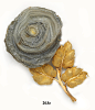 Geode and carved gold flower brooch. Buccellati