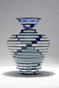 Polished Plate Glass Vase #70-78.  2013, 14.5"x12"x12".  This vase was created using a traditional design used by Sidney Hutter but with a new, sparkle-blue special effect pigment that creates a color unique shift when light interacts with 