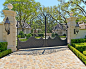 BOXWOOD : This formal residence is located in Highland Park, Texas features intensely manicured gardens, a cobblestone driveway, private motor court and a grand entry gate. 