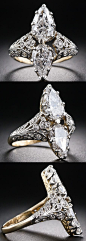 Edwardian twin-stone pear-shape diamond ring. This resplendent diamond dinner ring, dating back to the first decades of the 20th century, scintillates with a bright-white and shining pair of pear-shaped diamonds set back-to-back atop a finely handcrafted 