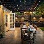 Example of a classic backyard patio kitchen design in San Francisco with a pergola