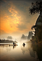 llbwwb:

Fisherman in Guilin by Woosra Kim.
