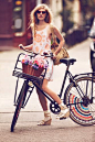 LOVE. Free People does a whole catalog of girls on bikes: 