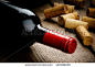 Bottle of red wine and corks on wooden table 正版图片|正版微利素材库 - 海洛创意（HelloRF） - 站酷旗下产品 - Shutterstock中国独家合作伙伴