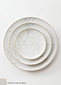 An unexpected dinnerware line created by French designer Coline le Corre. A  refined, geometric approach, inspired by the noble marble of Carrara.           * Dinner Plate (11”)     * Salad/Dessert Plate (8.75")     * Bread Plate (6.4”)