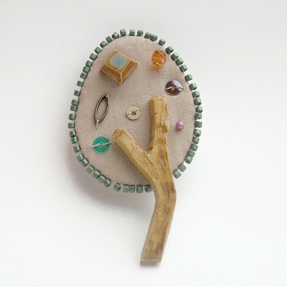 tree brooch.