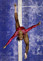 USA Olympic gymnast Gabby Douglas performs on the balance beam during the preliminary round of the women's Olympic gymnastics trials: