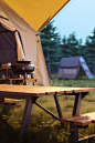 tent over the camper, in the style of tabletop photography, uhd image, atey ghailan, focus on table, fujifilm pro 800z, lively tableaus, cold light, wood, front view, 8k