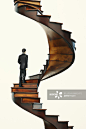 model of a man climbing a spiral stair case