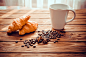 Cup of coffee with a croissant and coffee beans by Viktoriya Faion on 500px