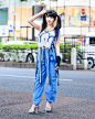 Tokyo Fashion on Instagram: “Twin-tailed Japanese Hatsune Miku fan Misuru (@meguharajuku) on the street in Harajuku wearing an MYOB top with hanging straps, blue cargo…”