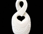 59 - Quadruple Infinity Twist Design : This infinity twist design symbolizes eternity and bonding of friendship, two lives becoming one for eternity and bonding of family.It also includes intricate engravings.    This carving measures approx: 1 5/8 long x