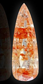 Close-up of the Koi diamond. The original 60 carat stone was found in the Congo in 2003. It is a low-quality stone with many flaws and inclusions, but has a unique combination of colors. It was cut down to a 32-carat koi fish shape.