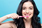 Young woman holding a toothbrush by Michiko Tierney on 500px