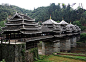 Chengyang Bridge. Photo: mazakii that genius [Flickr]    The wind and rain bridges were a type of bridge built by the Dong people (a minority ethnic group) in China. Because they live in the lowlands and the valleys with many rivers, the Dong people are e