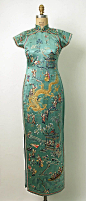 1932 Dress "The modern qipao was developed in Shanghai in the mid-1920s and was popularized by wealthy socialites. It was much more fitted than the original loose-fitting qipao."  