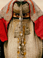 Rashaida Bride, Eritrea Photograph by Carol Beckwith and Angela Fisher. Veiled behind an elaborate mask called a burga, a Rashaida bride stays in seclusion before her wedding. The Muslim Rashaida are Bedouin merchants and camel breeders, originally from S