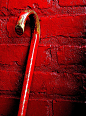 Red cane and wall