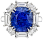 Sapphire and diamond ring set with a 7.11 carat cushion-cut sapphire and just under 3 carats of baguette and oval-cut diamonds. Via Diamonds in the Library.