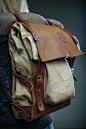 finelly organized backpack with few rollup pockets. canvas bag in a leather harness.: