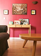 Design Sponge/ Living-room. The solid oak tree console is from Habitat. The big sepia photograph is by visual artist Anne-Catherine Becker Echivard. She takes amazing pictures staging dead fish. Her work is crazy! The small black and white picture of St. 