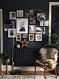 *especially love the dark walls* With historic details as the backdrop of their art-filled home, Nadia and Mark Singleton live in a 1,500-square-foot dwelling in Leicestershire, England.