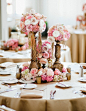 Gorgeous and so romantic! Pink + gold centerpieces.