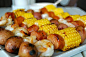 An easy, summer dinner. Shrimp, sausage, corn and potato kebabs