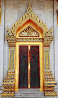 Carved wood door. Bangkok, Thailand