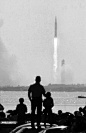 Father and son observe Apollo 11 launch; photograph by Ralph Crane: 