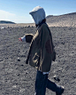 Photo by @___13__17 on April 27, 2024. May be an image of 1 person, overcoat, duffle coat, cloak, raincoat, gas mask, parka, face mask and crater.