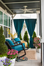 Add privacy to your porch with panels of rich blue Sunbrella outdoor fabric.: 