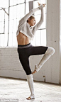 New clothes: She models the latest collection, which features leggings and leg warmers...: 