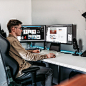 man sitting in front of a computer