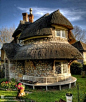 This thatched rubble stone cottage was built in 1811 in a little place called Blaise Hamlet near Bristol, England.