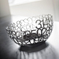 STEELFORME SERVEWARE BY OHM INDUSTRIAL DESIGNERS AND LISA SMITH  This is the number that equals "Pi"