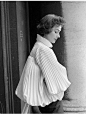 1953 Anne Gunning in white pleated blouson top by Irish fashion designer Sybil Connolly