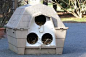 Dog house converted in to outdoor cat shelter
