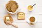 Breakfast including bread, honey, butter and coffee by Kamil Zabłocki on 500px
