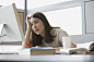 Frustrated college student studying at computer by Hero Images  on 500px