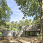 An Indoor-Outdoor Concrete Family Home