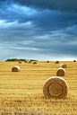 Hay Bales in Field with Stormy Sky by John Kroetch on 500px