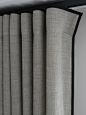 Simple and smart grey curtain with a contemporary wave heading. Thin black contrast banding adds a touch of bespoke luxury.