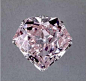 The Mouawad Pink diamond is weighing 21.06. having a radiant-cut, fancy pink colour, and a VS-1 clarity. Its cut is a combination of the emerald-cut (on the top) and the brilliant-cut (on the bottom). Although this Mouawad Pink is the smallest Mouawad's c