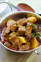 Massaman Curry with beef, potatoes, peanuts and spices.