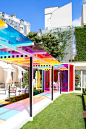 daniel buren creates a chromatic landscape in the gardens of hotel le bristol paris: 