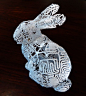 Bunny-Squared This is a self-referential bunny — a sculpture of a bunny, the surface of which is tiled by 72 copies of the word "Bunny." This piece is part of a larger series of "autologlyphs," following on from HS's "Sphere Autol